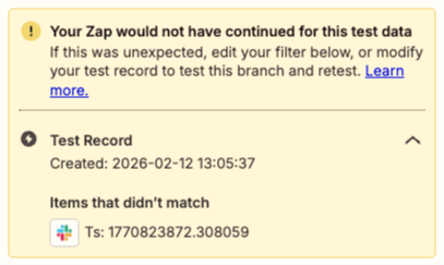 Yellow highlight on left side and triangle with exclamation point at top left indicate the example has not passed the filter condition.