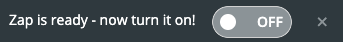 A screenshot of a gray slider button in the OFF position.
